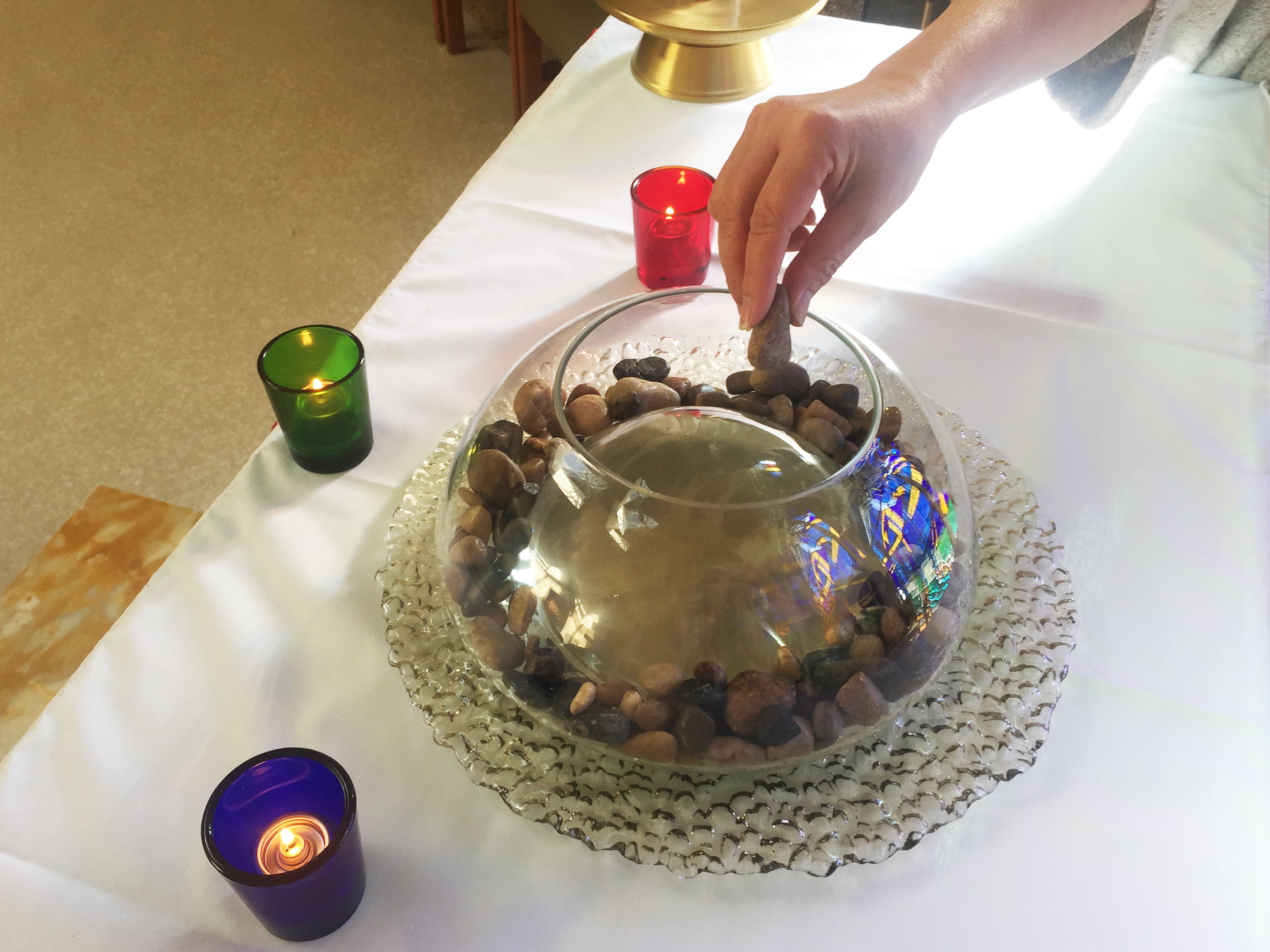 Placing a rock in a vessel of water symbolizes the ripple effect of someone's life. It's one way staff at St. Vincent's: Langara may choose to honour the deceased.