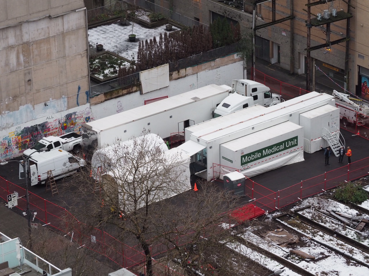 Aerial shot of MMU set up in vacant parking lot in the DTES.