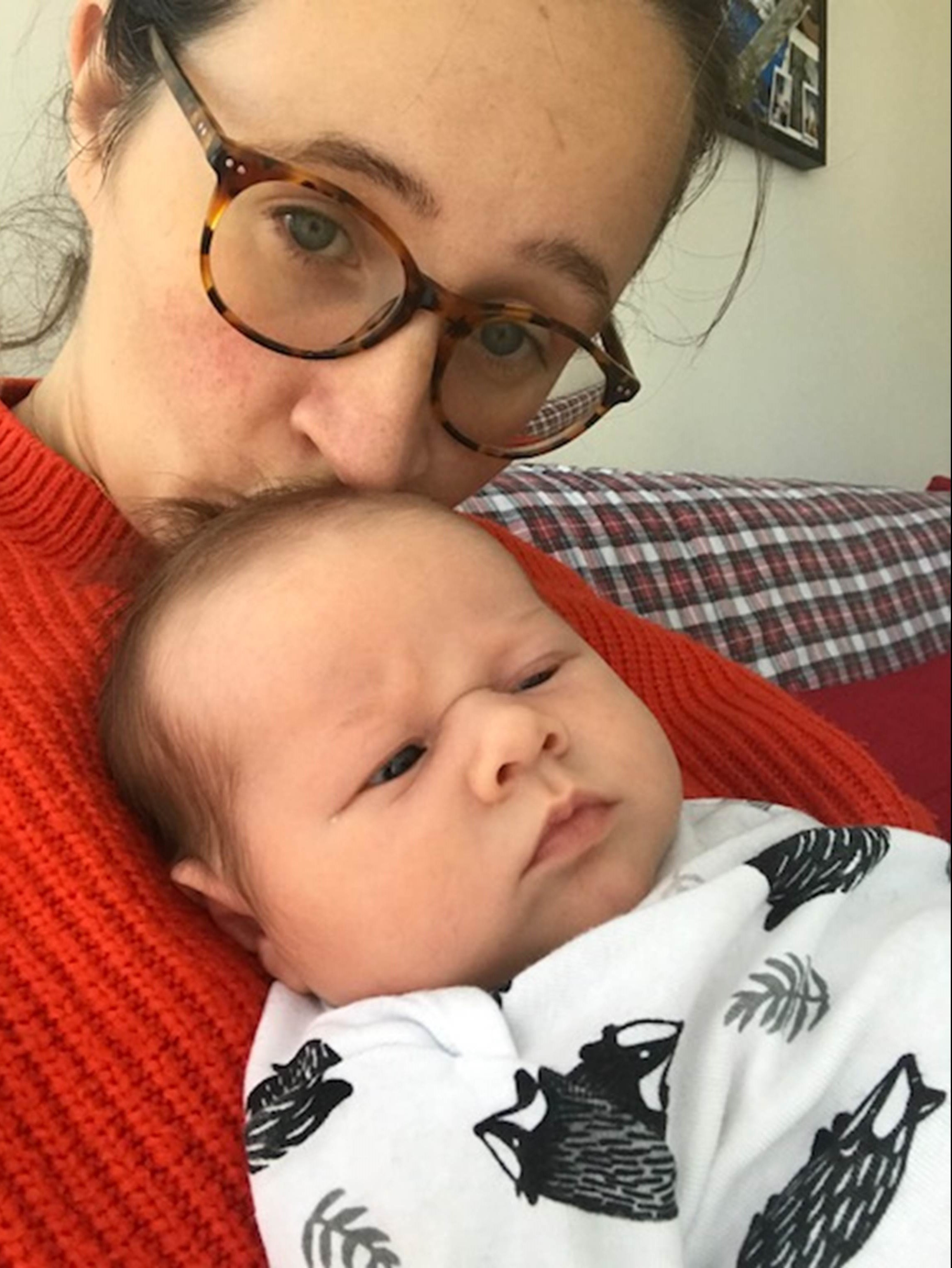 First time mom Margaux holds her newborn daughter Matilda.