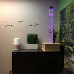 Lava lamp, nature mural, plants in sensory modulation room.