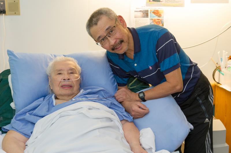 Ray Chan with his mother, Yuk Sim, a resident at Mount Saint Joseph Hospital