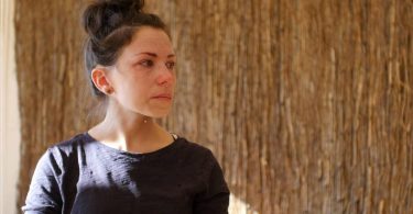 In Dosed, cameras follow Adrianne's struggle with an addiction to opioids and her attempts to stop using hard drugs with a combination of magic mushrooms and psychedelic-assisted psychotherapy. (Photo Credit: DOSED)