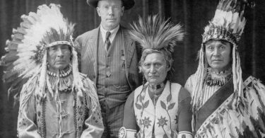 James Teit with three Interior chiefs in Ottawa, 1916. Left to right: Chief John Tetlenitsa (Nlaka’pamux), James Teit, Chief Paul David (Ktunaxa) and Chief Thomas Adolph (St’at’imc). Photograph by Frederick Lyonde. Copy courtesy of Sigurd Teit. (Photo credit: Vancouver Sun)