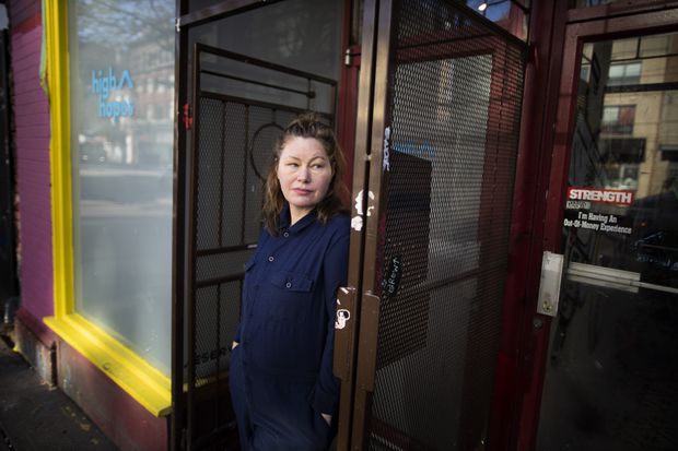 Sarah Blyth, founding member of High Hopes Cannabis Collective, which helps people get access to medical cannabis as a replacement for opioids, outside the facility in Vancouver's Downtown Eastside, on Nov. 28, 2019. (Photo credit: The Globe and Mail)