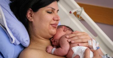 Mina Asgari and her new son Soren have skin-to-skin contact, a practice encouraged at St. Paul's Hospital, which recently achieved a Baby Friendly Initiative designation. Photo: Brian Smith